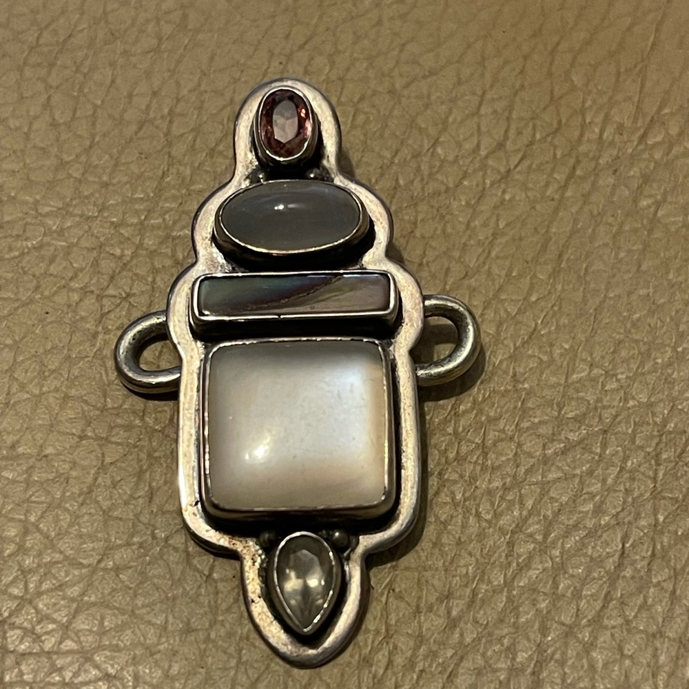 Tabra charm with assorted stones